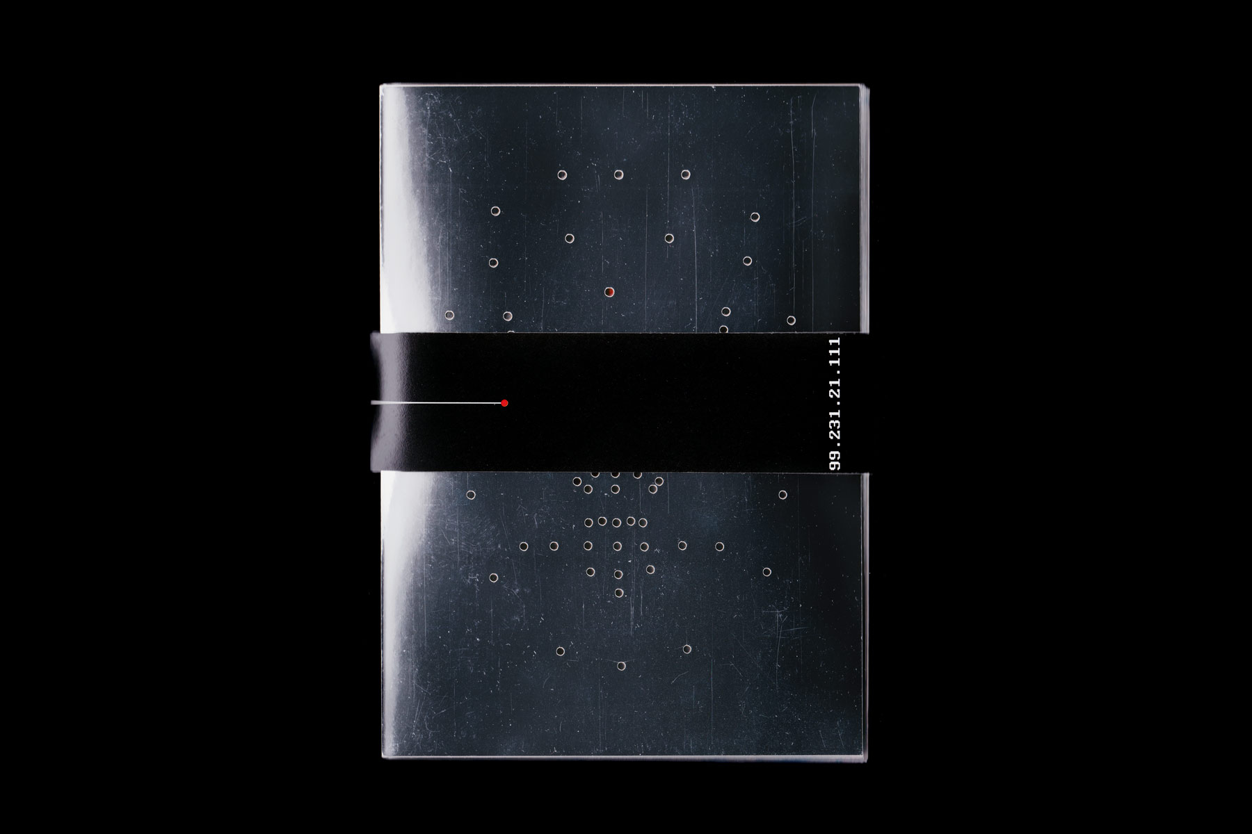 Metallic front cover with black belly band.